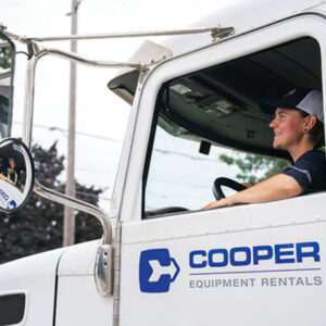 Cooper Equipment Rentals Delivery truck with driver.