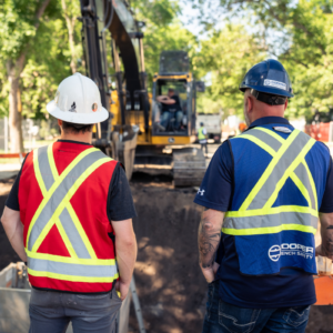 Cooper equipment rentals employees wearing PPE at a jobsite